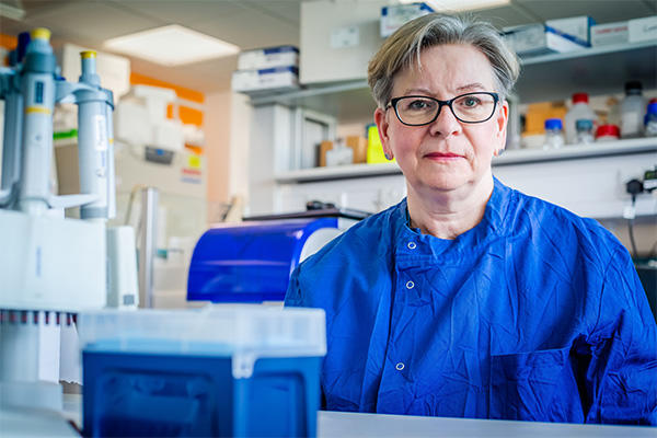 Prof Sharon Peacock in lab.jpg